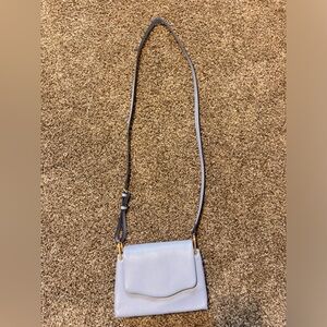 A new day light blue shoulder purse